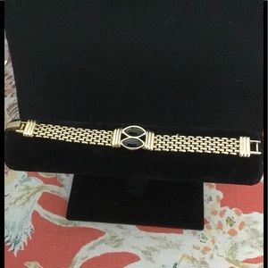 S.A.I. Gold Tone Panther Link Bracelet Blk Accents